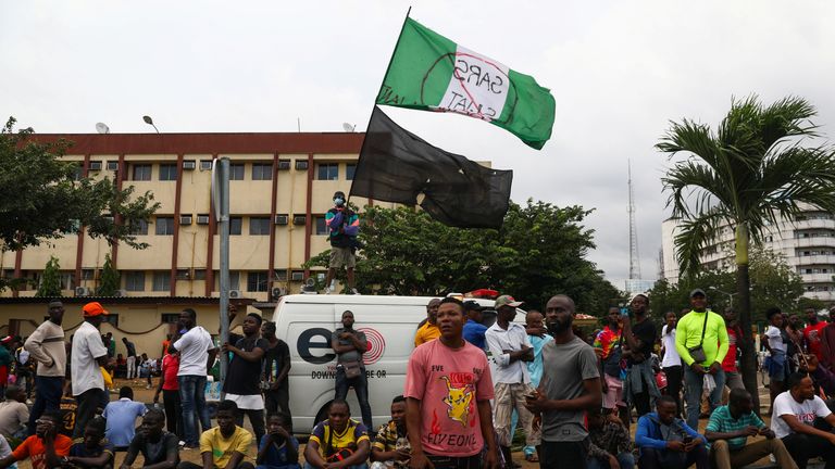 •	Demonstrators gather on the street to protest against alleged police brutality, despite a round-the-clock curfew imposed by the authorities on the Nigerian state of Lagos, Nigeria October 20, 2020. REUTERS/Temilade Adelaja