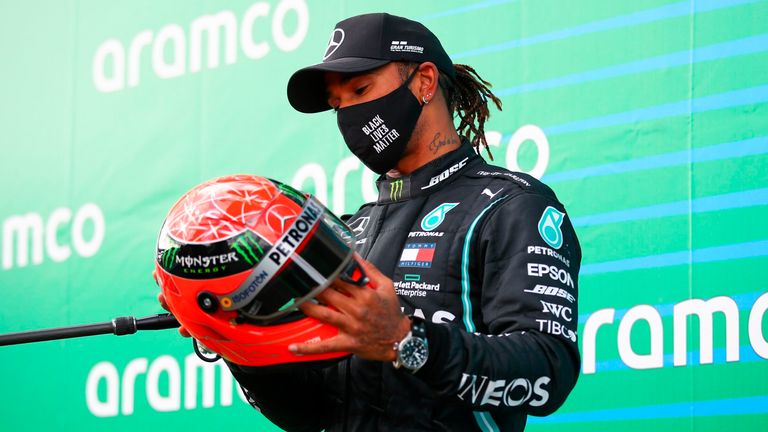 Lewis Hamilton lifts Schumacher's old helmet after ...