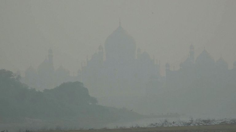 TAJ MAHAL MONUMENT SEEN COVERED IN SMOG FROM DISTANCE