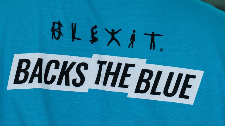 A t-shirt with the words &#39;Blexit Backs The Blue&#39; worn by a Donald Trump supporter