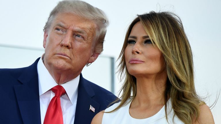 US President Donald Trump and First Lady Melania Trump watch as planes flyover during the 2020 "Salute to America" event in honor of Independence Day on the South Lawn of the White House in Washington, DC, July 4, 2020. (Photo by SAUL LOEB / AFP) (Photo by SAUL LOEB/AFP via Getty Images)