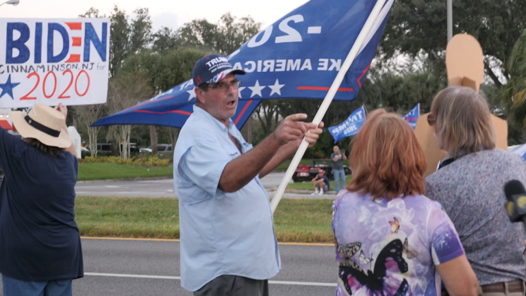 Outside a Joe Biden rally in Tampa, small but vocal groups of Democrats and Republicans faced off