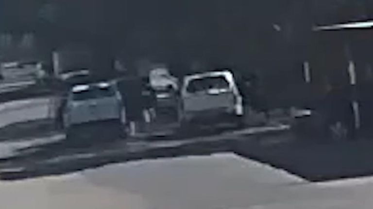 Grainy CCTV pictures appear to show Mr Muchehiwa being transferred into a second vehicle nearby
