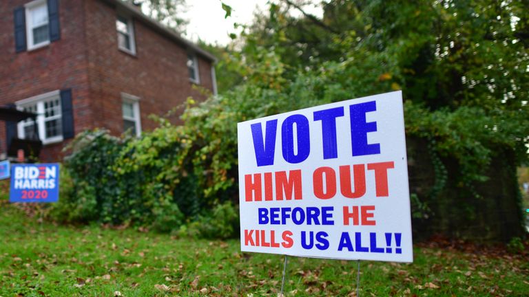 PHILADELPHIA, PA - NOVEMBER 01: A front yard placard states "VOTE HIM OUT BEFORE HE KILLS US ALL!!" and multiple campaign signs in support of Democratic presidential nominee Joe Biden on the penultimate day before the general election on November 1, 2020 in Philadelphia, Pennsylvania. The grassroots get of the vote campaign efforts of canvassing, door knocking, literature drops, phone calling, and texting, will prove crucial in determening the outcome of voter turnout and ultimately the presidency. With the election only two days away, Trump held four rallies across Pennsylvania yesterday, as he vies to recapture the Keystone State's vital 20 electoral votes. In 2016, he carried Pennsylvania by only 44,292 votes out of more than 6 million cast, less than a 1 percent differential, becoming the first Republican to claim victory here since 1988. (Photo by Mark Makela/Getty Images)