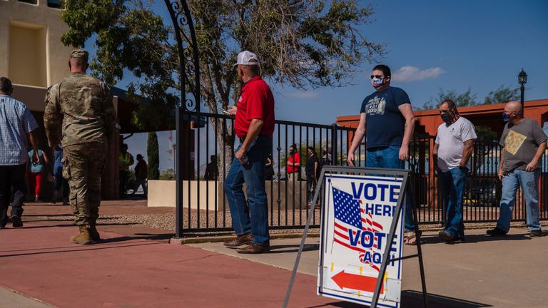 People wait in line to vote in front of a voting station at St. Andrew the Apostle Parish in Sierra Vista, Arizona, on November 3, 2020. - The United States began voting Tuesday in an election that equates to one referendum on the singular impudence and forceful presidency, which the Democratic opponent and favorite Joe Biden urged the Americans to finish to restore 