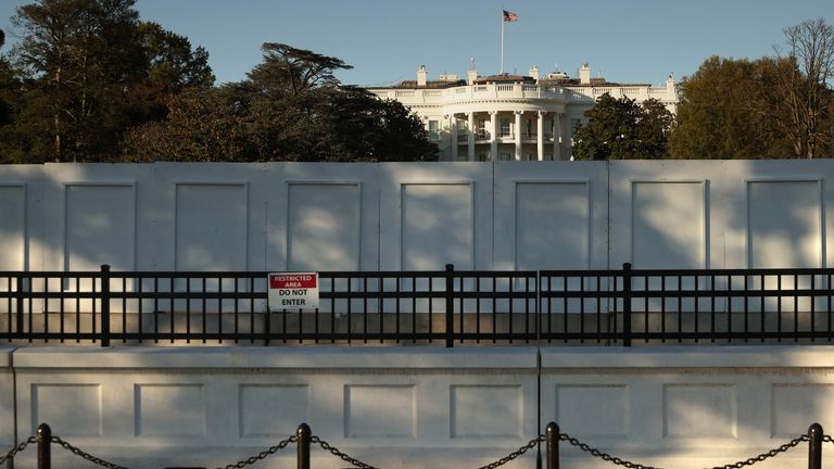 WASHINGTON, DC - NOVEMBER 2: The south side of the White House is seen behind layers of fencing less than 24 hours before Election Day on November 2, 2020 in Washington, DC.  Additional layers of fencing have been placed for several months around the White House after the violence that followed George Floyd's murder by police in Minneapolis earlier this year.  (Photo by Chip Somodevilla / Getty Images)