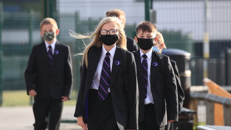 Pupils wear protective face masks on the first day back to school at Outwood Academy Adwick in Doncaster, as schools in England reopen to pupils following the coronavirus lockdown.