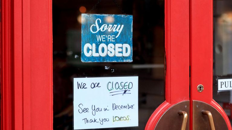 A closed sign outside a cafe in Leicester, on the first day of a second national lockdown for England.