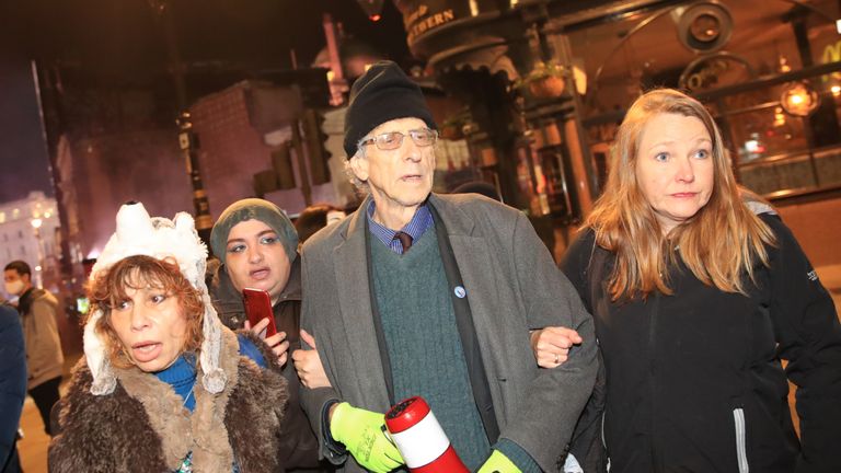 Piers Corbyn, brother of former Labor leader Jeremy Corbyn, attends the Million Mask March anti-establishment protest in London's Trafalgar Square, the first day of a four-week nationwide lockdown on England.