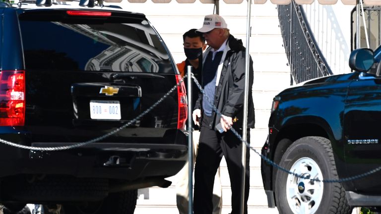 US president Donald Trump walks to the motorcade on the South Lawn of the White House in Washington, DC, on November 7, 2020, as he departs for an undisclosed location. (Photo by ANDREW CABALLERO-REYNOLDS / AFP) (Photo by ANDREW CABALLERO-REYNOLDS/AFP via Getty Images)