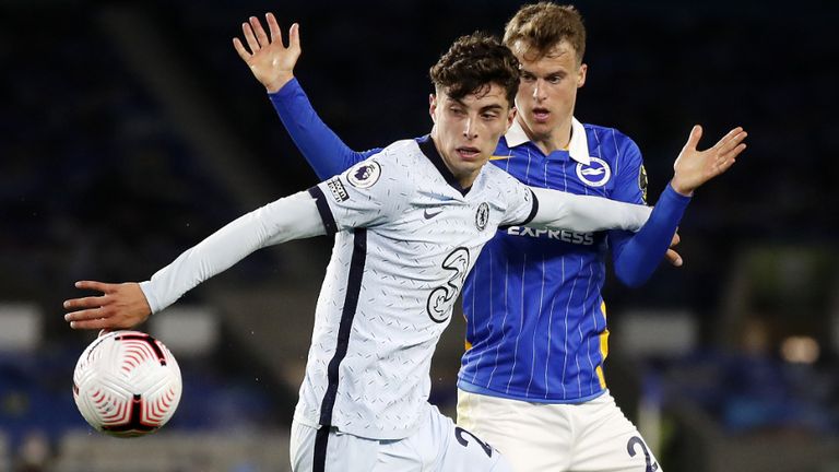 Chelsea's Kai Havertz and Brighton and Hove Albion's Solly March battle for the ball during the Premier League match at the AMEX Stadium, Brighton.