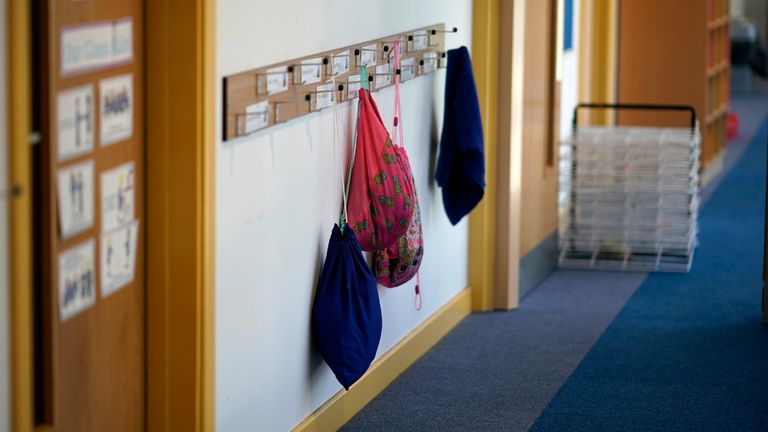 ALTRINCHAM, ENGLAND - APRIL 08:  Children's PE bags hang on coat hooks at Oldfield Brow Primary School during the coronavirus lockdown on April 08, 2020 in Altrincham, England. The government announced the closure of UK schools from March 20 except for the children of key workers, such as NHS staff, and vulnerable pupils, such as those looked after by local authorities. The prime minister has said schools will remain closed "until further notice," and many speculate they may not reopen until next term. (Photo by Christopher Furlong/Getty Images)