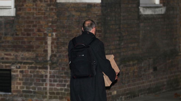 Prime Minister Boris Johnson's top aide Dominic Cummings leaves Downing Street, London, with a box, following reports that he is set to leave his position by the end of the year.