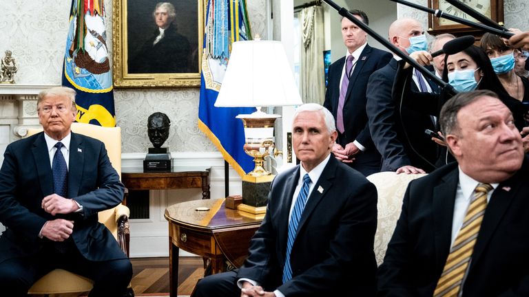 WASHINGTON, DC - JUNE 24: (L-R) U.S. President Donald Trump, Vice President Mike Pence and Secretary of State Mike Pompeo attend a meeting with Polish President Andrzej Duda in the Oval Office of the White House on June 24, 2020 in Washington, DC. Duda, who faces a tight re-election contest in four days, is Trump's first world leader visit from overseas since the coronavirus pandemic began. (Photo by Erin Schaff-Pool/Getty Images)