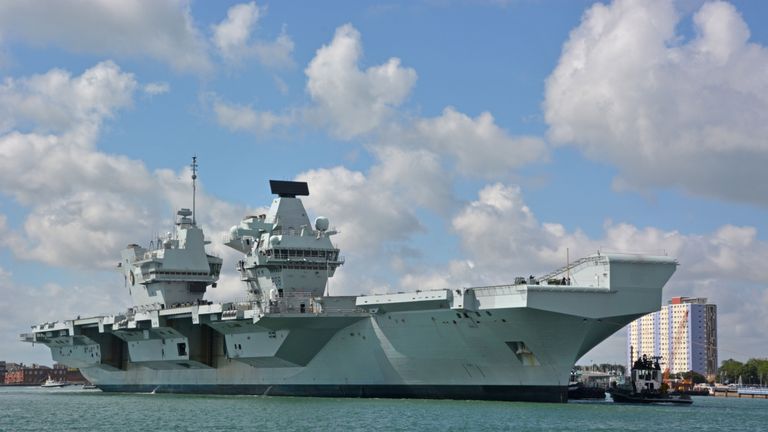 The Royal Navy aircraft carrier HMS Queen Elizabeth arrives back in Portsmouth Naval Base after carrying out sea and flight tests with F35B Lightning jets to prepare it for Carrier Strike Group readiness ahead of its first operational deployment next year.