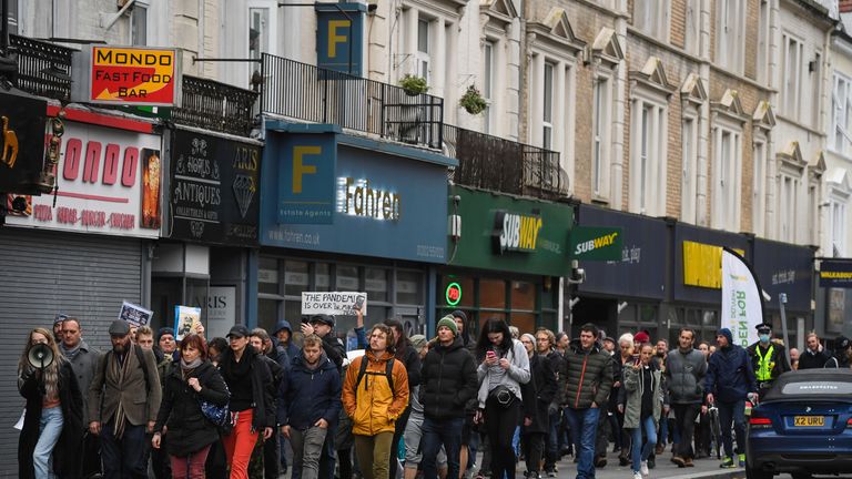 BOURNEMOUTH, ENGLAND - NOVEMBER 21: Anti-lockdown protesters march through the town centre on November 21, 2020 in Bournemouth, England. (Photo by Finnbarr Webster/Getty Images)