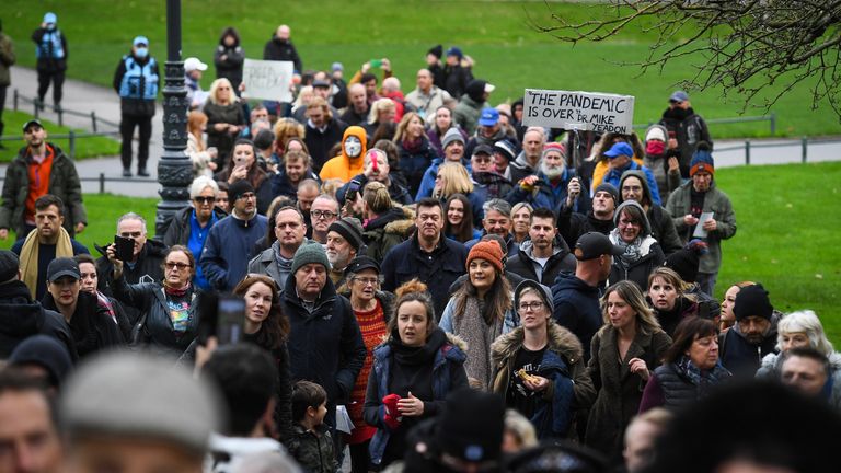 BOURNEMOUTH, ENGLAND - NOVEMBER 21: Anti-lockdown protesters march through the town centre on November 21, 2020 in Bournemouth, England. (Photo by Finnbarr Webster/Getty Images)