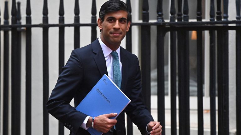 Britain&#39;s Chancellor of the Exchequer Rishi Sunak leaves 11 Downing Street in central London, on November 25, 2020, before heading to the House of Commons to present his economic spending review. - Britain&#39;s government, seeking to support the pandemic-ravaged economy and the nation&#39;s post-Brexit future, will on Wednesday unveil its eagerly-awaited spending plans. Finance minister Rishi Sunak will deliver his spending review to parliament, one week before England ends a month of restrictions aimed at cutting a second wave of infections. (Photo by Ben STANSALL / AFP) (Photo by BEN STANSALL/AFP via Getty Images)