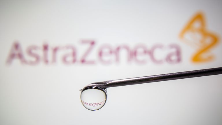 AstraZeneca&#39;s logo is reflected in a drop on a syringe needle in this illustration taken November 9, 2020. 