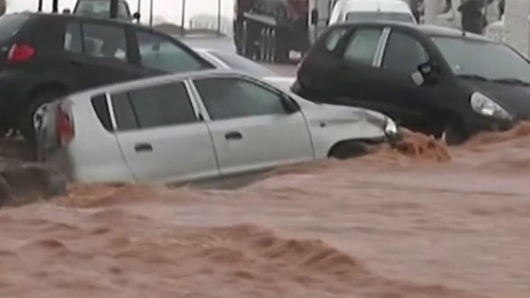 Cars are washed out towards sea in Crete flooding