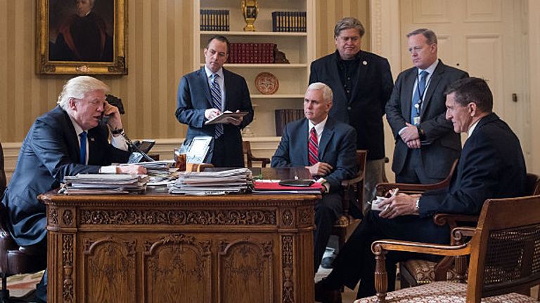 January 2017: Trump in the Oval Office with Chief of Staff Reince Priebus, Vice President Mike Pence, Chief White House Strategist Steve Bannon, Press Secretary Sean Spicer, and National Security Advisor Michael Flynn