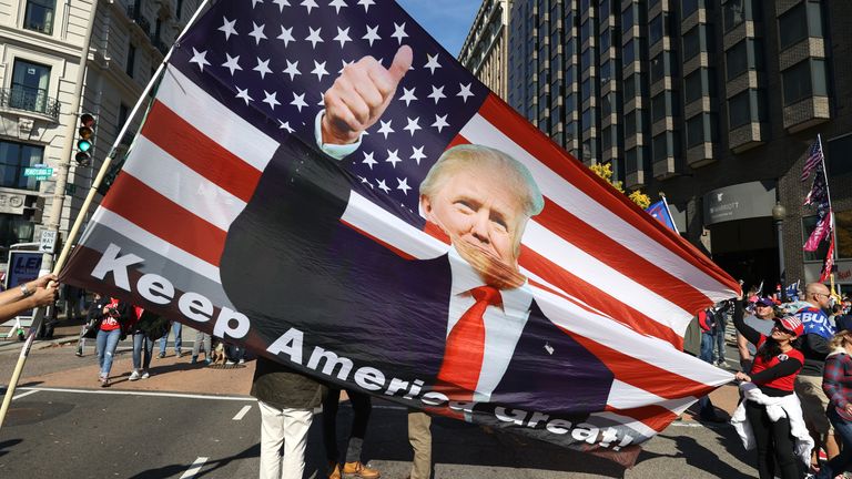 Protesters waved American flags in support of Donald Trump