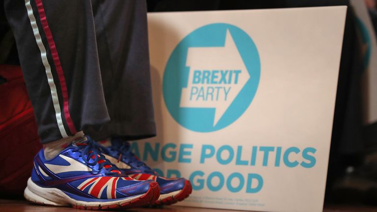 People wait for Brexit Party leader Nigel Farage to speak at an event in Barnsley while on the General Election campaign trail