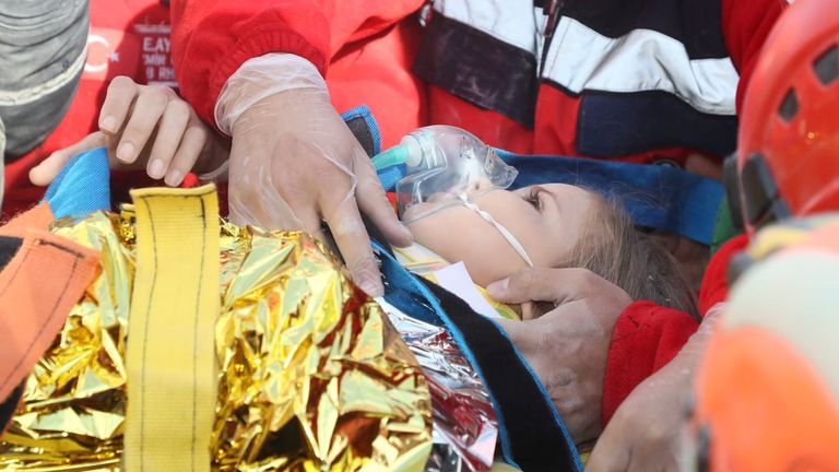 Rescue workers carry a 4-year-old girl, Ayla Gezgin, out from a collapsed building after an earthquake in the Aegean port city of Izmir, Turkey November 3, 2020. Turkey&#39;s Disaster and Emergency Management Presidency (AFAD)/Handout via REUTERS ATTENTION EDITORS - THIS PICTURE WAS PROVIDED BY A THIRD PARTY. NO RESALES. NO ARCHIVE.