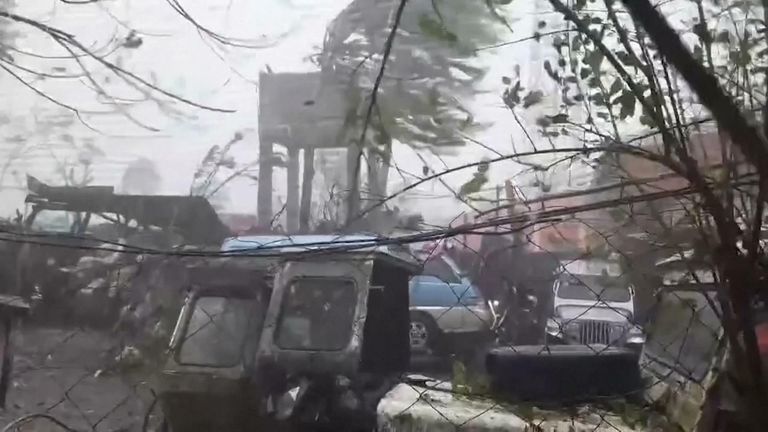 Many videos have been posted to social media of heavy rain and wind hitting the Philippines as Super Typhoon Goni arrives. 