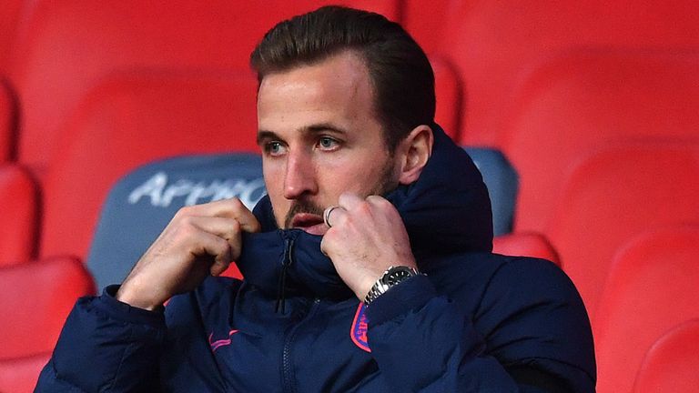 LONDON, ENGLAND - NOVEMBER 12: Harry Kane of England sits in the stands in between the social distancing seat markers during the international friendly match between England and the Republic of Ireland at Wembley Stadium on November 12, 2020 in London, England. Sporting stadiums around the UK remain under strict restrictions due to the Coronavirus Pandemic as Government social distancing laws prohibit fans inside venues resulting in games being played behind closed doors. (Photo by Ben Stansall 