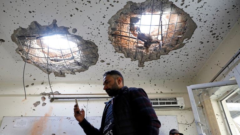 Afghan journalists film inside a class after yesterday&#39;s attack at the university of Kabul, Afghanistan November 3, 2020. REUTERS/Mohammad Ismail