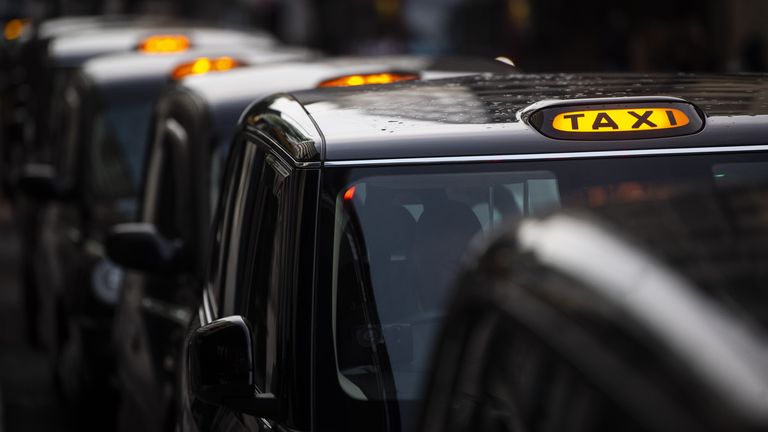 A queue of black cabs outside Victoria Station, London. London taxi drivers are facing long waits for a single fare after the industry has seen a severe drop in demand as coronavirus restrictions continue to reduce travel and office working.
