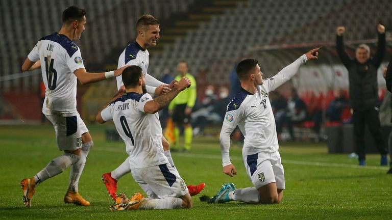 Luka Jovic of Serbia celebrates after scoring his team&#39;s first goal during the UEFA EURO 2020 Play-Off Final between Serbia and Scotland at Rajko Mitic Stadium on November 12, 2020 in Belgrade, Serbia