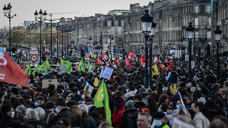 Protesters march in Paris during a demonstration against the "global security" draft law