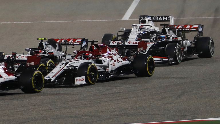 Haas F1&#39;s French driver Romain Grosjean (R) driving before the crash