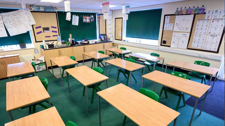 A classroom is set out with socially distanced seating for year 6 pupils but remains empty due to lack of pupils returning in that year group, at Greenacres Primary Academy in Oldham, northern England on June 18, 2020. (Photo by OLI SCARFF / AFP) (Photo by OLI SCARFF/AFP via Getty Images)