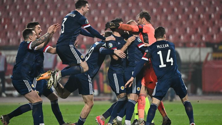 Scotland&#39;s players celebrate after winning the Euro 2020 play-off qualification football match between Serbia and Scotland at the Red Star Stadium in Belgrade on November 12, 2020