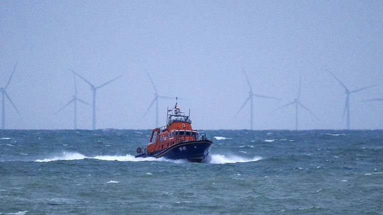 The RNLI severn class Lifeboat head to Newhaven harbour after searching for the missing two fishermen that went missing near Seaford, Sussex, when their fishing boat, Joanna C, sank off the coast near Seaford, East Sussex on Saturday.