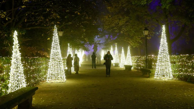 People walk through the Botanical Garden of Madrid in Spain