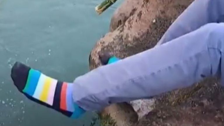 British diplomat&#39;s stripey socks receive special attention before he rescues a drowning student 