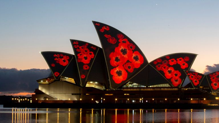SYDNEY, AUSTRALIA - NOVEMBER 11: A general view is seen of poppies projected onto the sails of the Opera House on November 11, 2020 in Sydney, Australia. (Photo by Jenny Evans/Getty Images)
