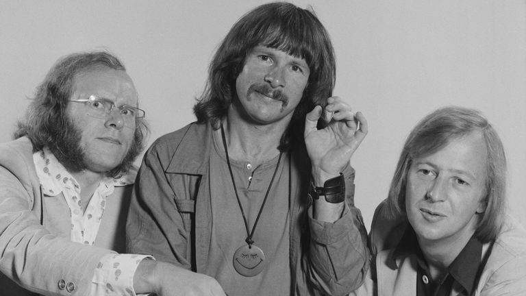English comic actors (left to right) Graeme Garden, Bill Oddie and Tim Brooke-Taylor, of the BBC TV comedy series &#39;The Goodies&#39;, playing a toy piano, 27th July 1975