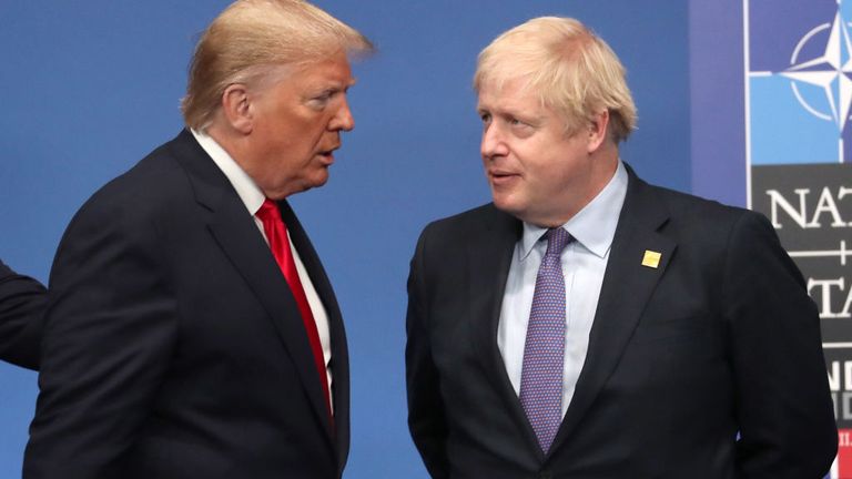 HERTFORD, ENGLAND - DECEMBER 04: US President Donald Trump and British Prime Minister Boris Johnson onstage during the annual NATO heads of government summit on December 4, 2019 in Watford, England. 