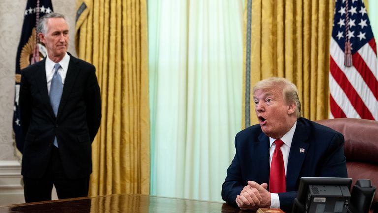 President Donald Trump (R) is joined by Gilead Sciences Chairman and CEO Daniel O&#39;Day