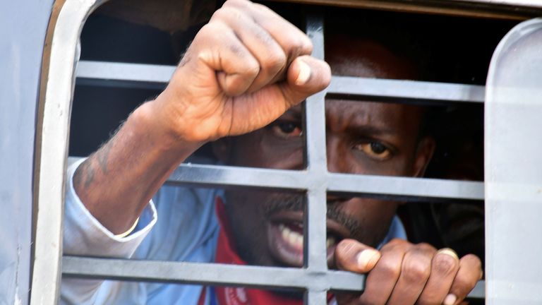 Ugandan presidential candidate Robert Kyagulanyi, also known as Bobi Wine, was taken away by police