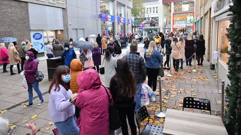 Shoppers queuing for Primark in Cardiff, as restrictions are relaxed following a two-week "firebreak" lockdown across Wales.