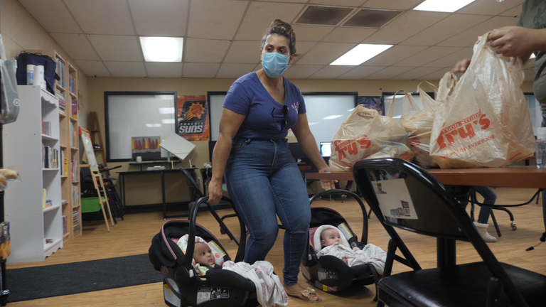 A mother gets help at a community centre in Phoenix
