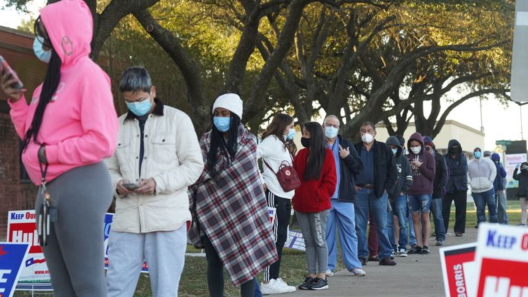People line up outside a polling station during the Election Day in Houston, Texas, U.S. November 3, 2020. REUTERS/Go Nakamura