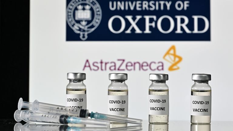 An illustration picture shows vials with Covid-19 Vaccine stickers attached and syringes, with the logo of the University of Oxford and its partner British pharmaceutical company AstraZeneca, on November 17, 2020. (Photo by JUSTIN TALLIS / AFP) (Photo by JUSTIN TALLIS/AFP via Getty Images)