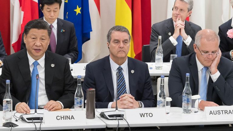 Chinese President Xi Jinping (left) and Australian Prime Minister Scott Morrison (right)